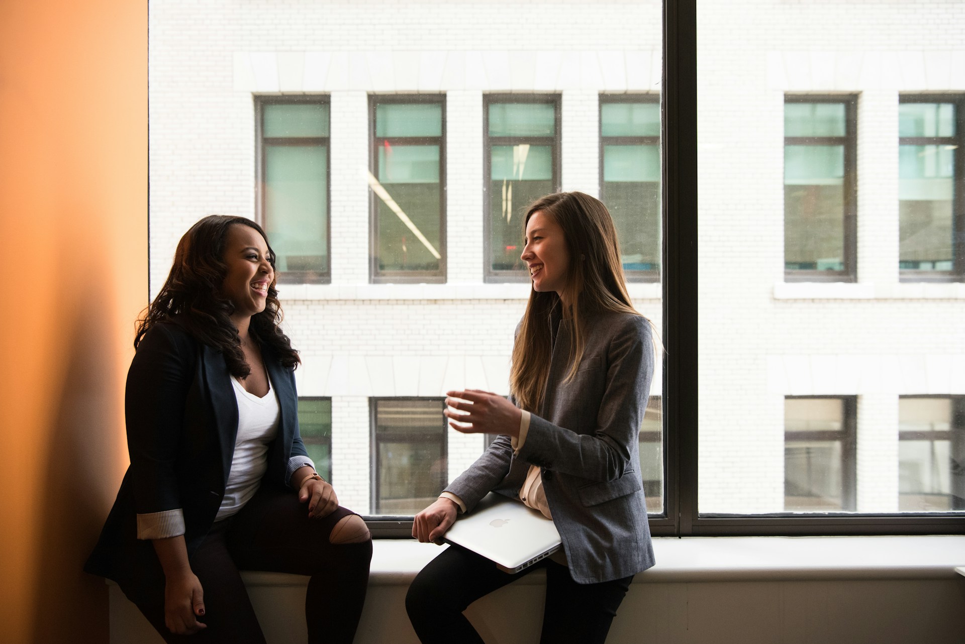 Diverse group of colleagues meeting informally in a modern office space